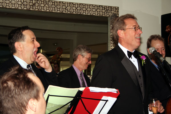 The father of the groom offering a toast